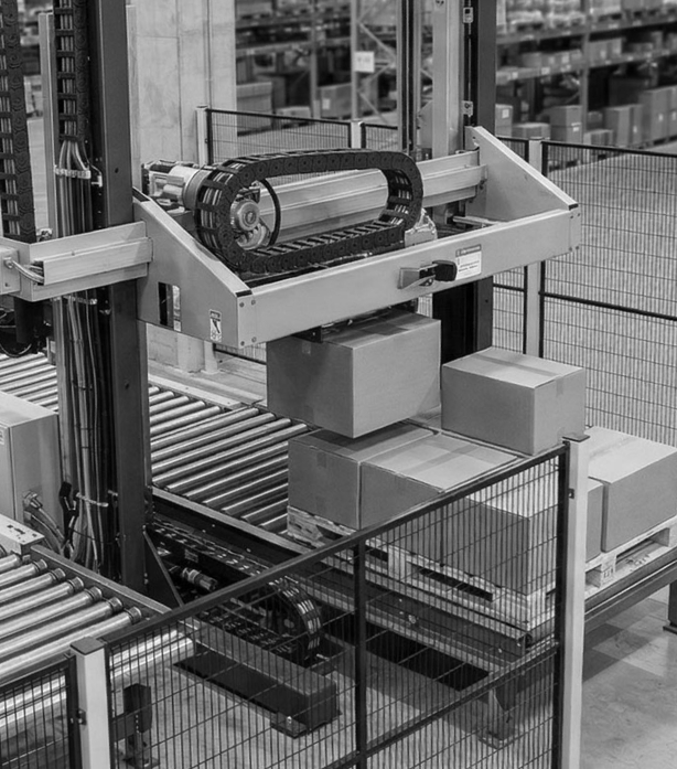 A machine stacking boxes onto a cargo pallet
